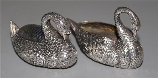 An Edwardian novelty silver pin cushion modelled as a swan, Adie & Lovekin, Birmingham, 1906 and an Ari D. Norman swan pin cushion.